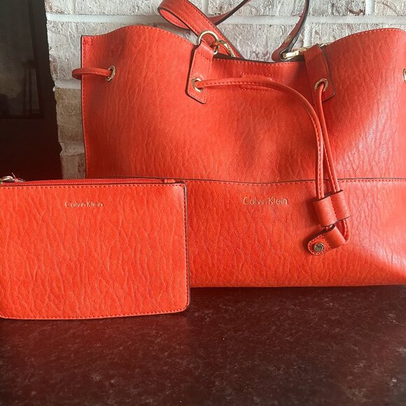Calvin Klein Purse, Reversible Leather Look Orange Purse Shoulder Bag Drawstring - Picture 1 of 9